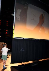 Tallis watching back stage